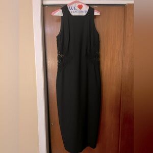 Cocktail dress with mesh side design